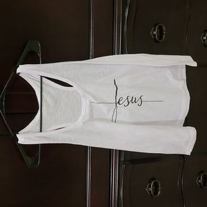White XL tank top with Jesus and a cross on it never worn  Boutique purchase.